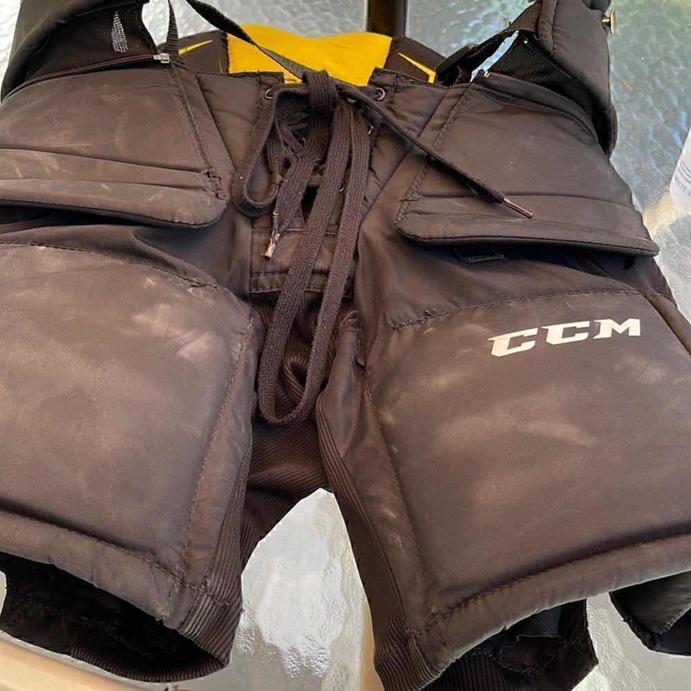 CCM premier size med junior breezers, small hole in front, I’ll let you sew it.